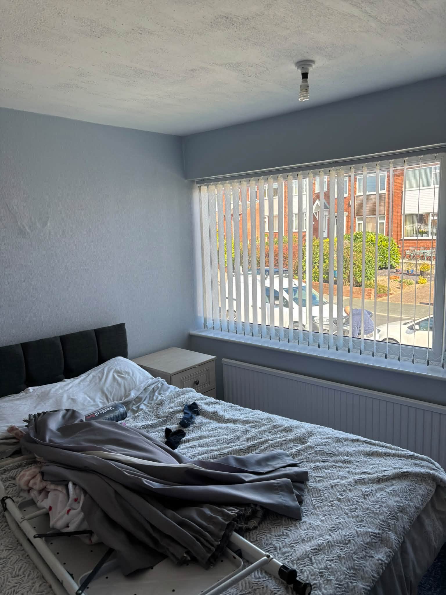 Bedroom feature wallpaper — project photograph