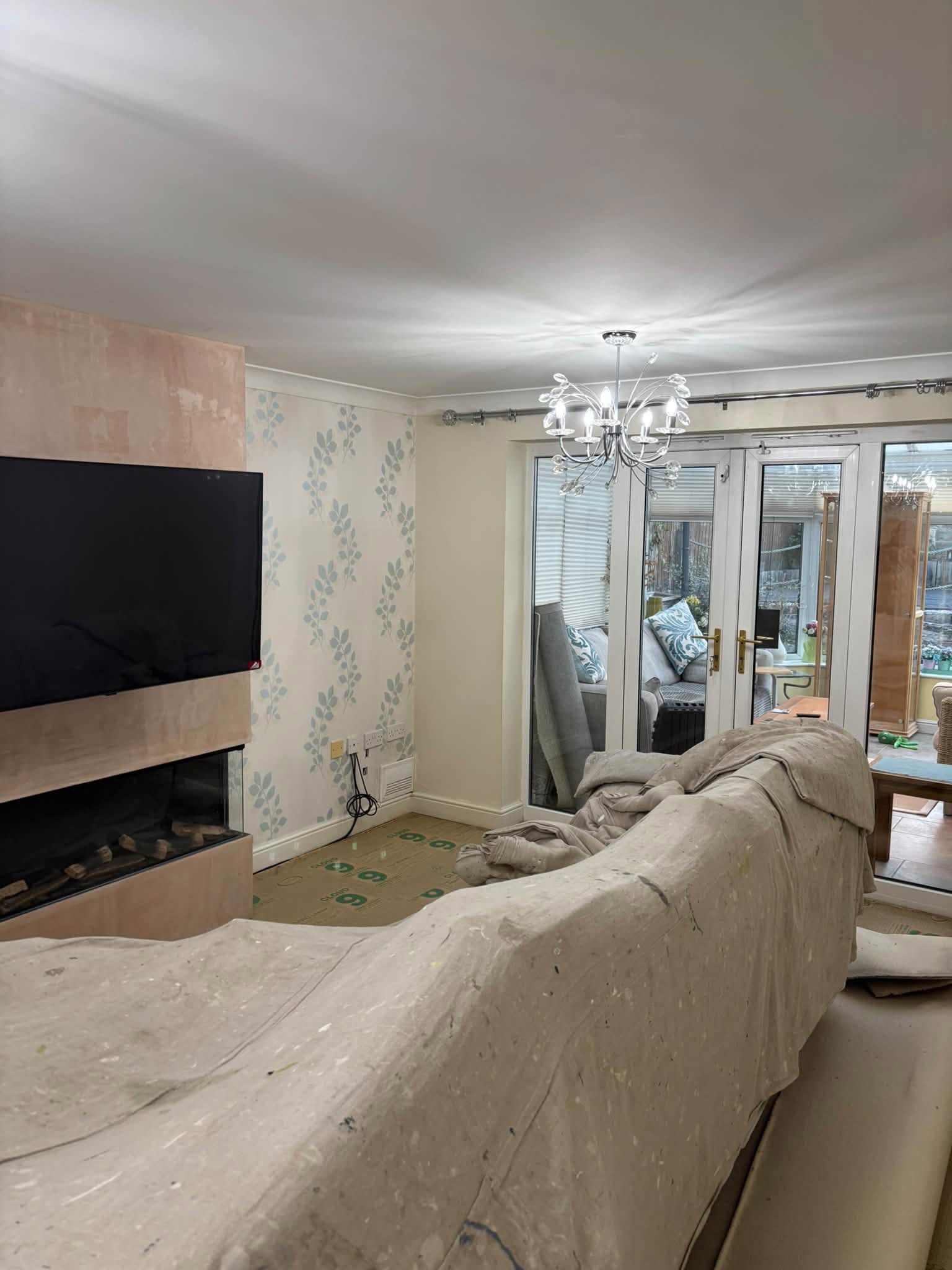 Living room wallpaper & feature wall — project photograph